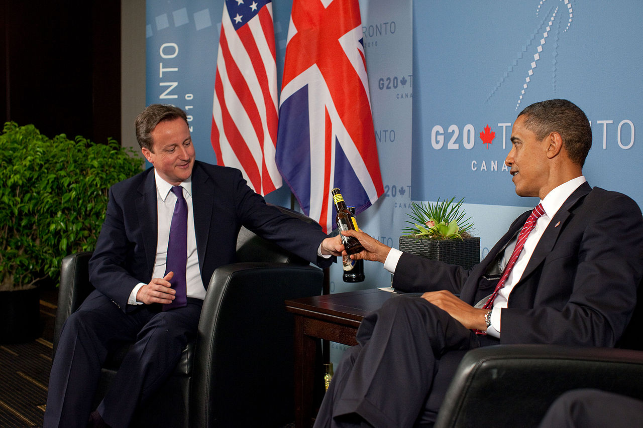 President Barack Obama (right) discussing beer exports with some other guy