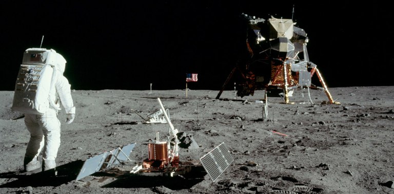 Buzz Aldrin conducting an experiment on the Moon as part of the Apollo 11 mission