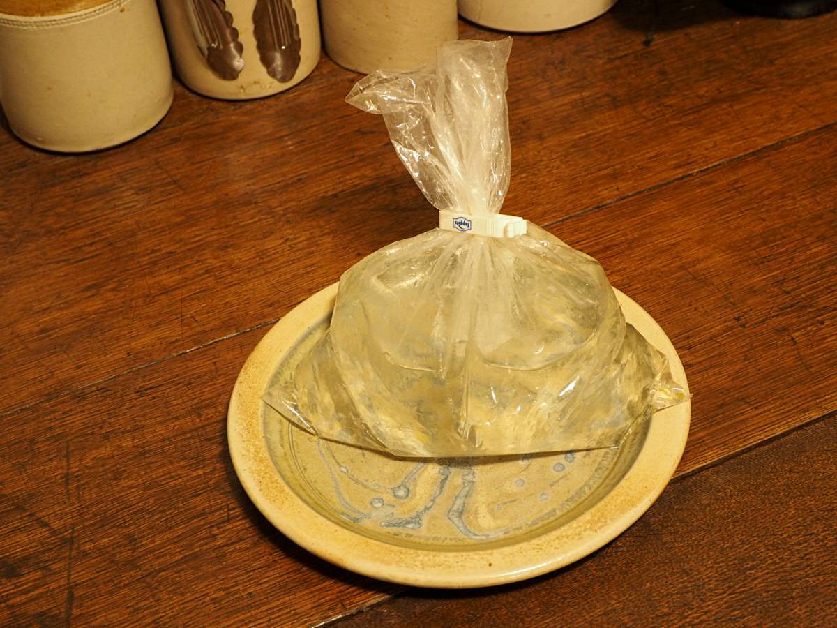 Plastic bag, with Klippit, used as a weight for the sauerkraut